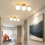 Ascelin Modern Ceiling Light Fixture - Gold & Black, Glass Globes, 2-3 Bulbs — Main Image